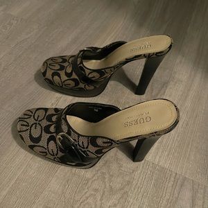 Guess High heels! Women’s 6! Bought at Macy’s and never worn! Black